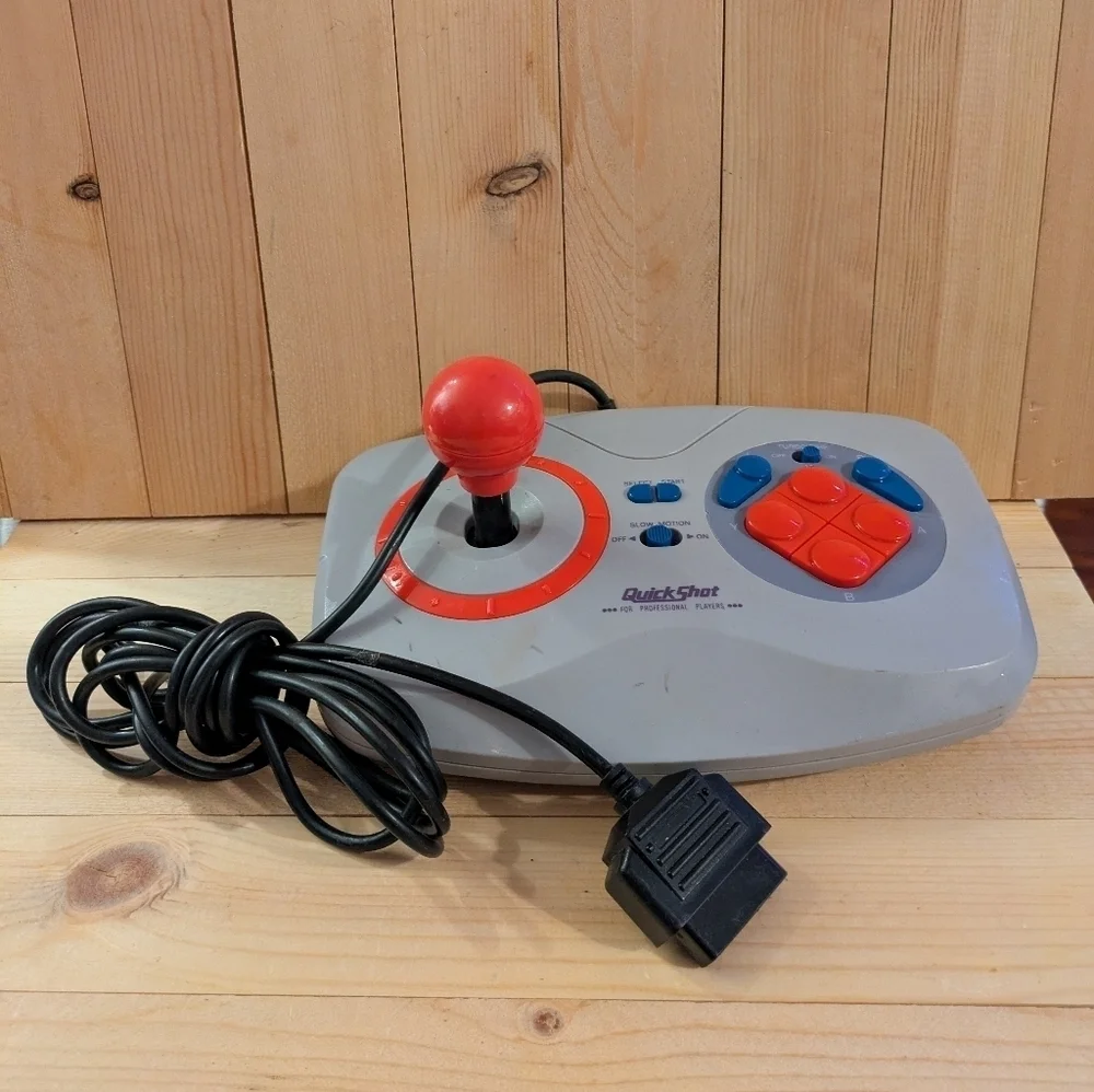 Gray and Red Joystick Controller